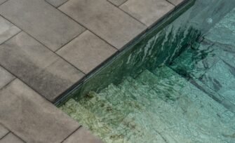 clear-water-swimming-pool-daytime_181624-18059 Why Is My Pool Water Green? Simple Fixes from Trusted Swimming Pool Contractors in Singapore